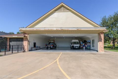 Hangar recently painted. Nice epoxy coated floor. Clean as a pin. 3 different access doors besides bi-fold.