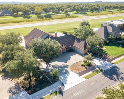 Property is located near both golf courses and clubhouse.